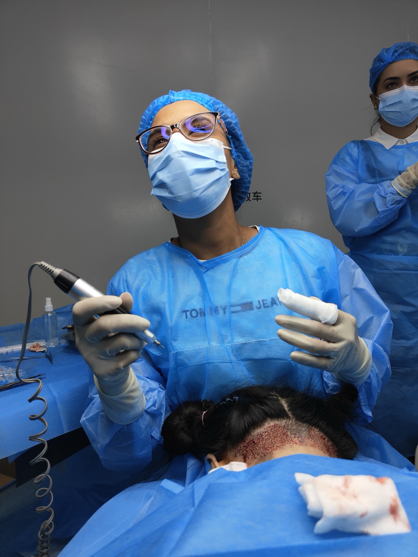 Dr. Paloma performing a procedure during her training in China